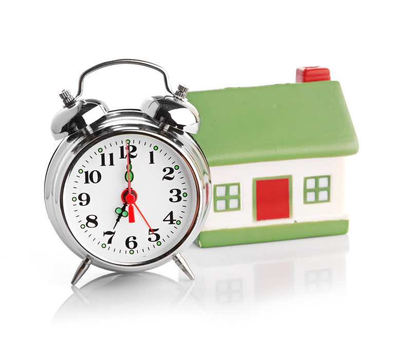 clock and house